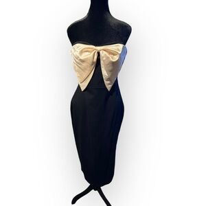 Fore strapless bow front midi pencil dress with side slit